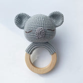 Gray koala crocheted teething rattle with wooden ring